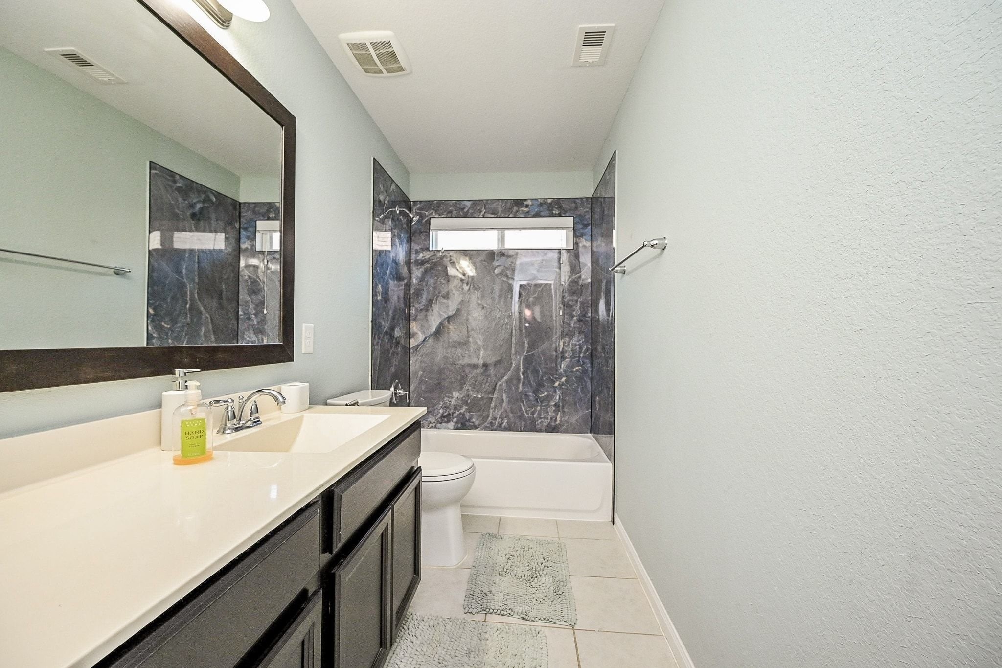 7042 Sliding Rock Circle Spring, TX 77379 - Photo 33 of 44 Stylishly updated third bathroom with modern finishes.