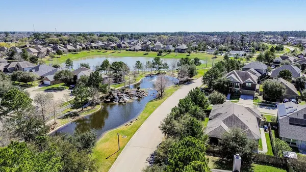 a view of a lake with a city
