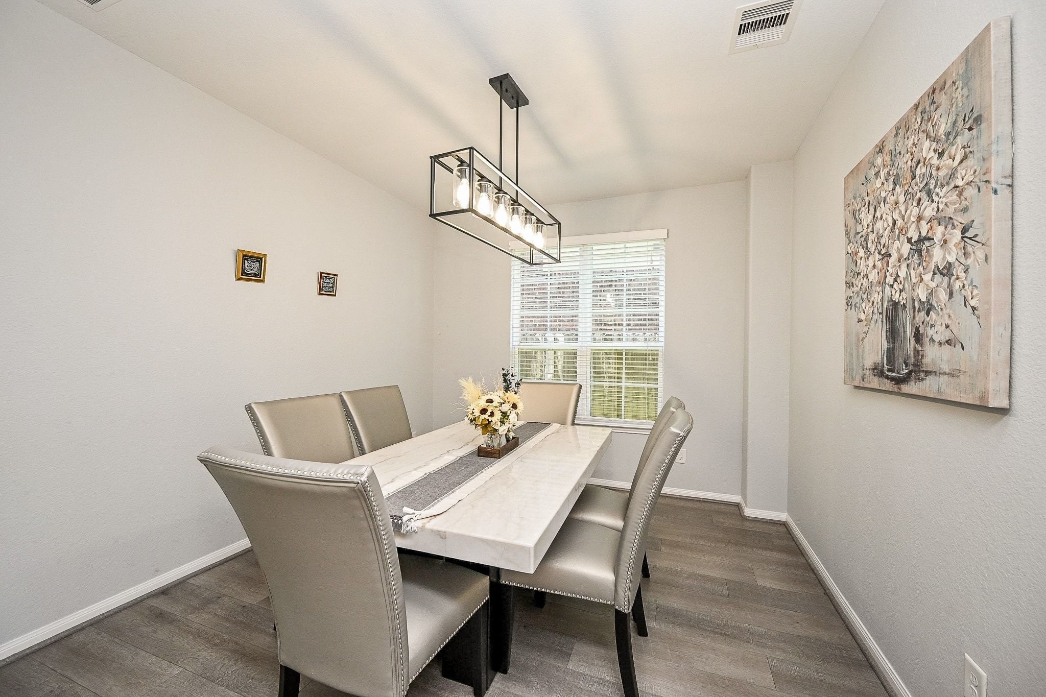 7042 Sliding Rock Circle Spring, TX 77379 - Photo 5 of 44 Elegant dining room with ample space for gatherings.