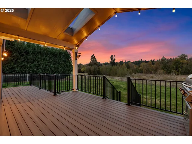 a view of balcony with wooden floor and city view