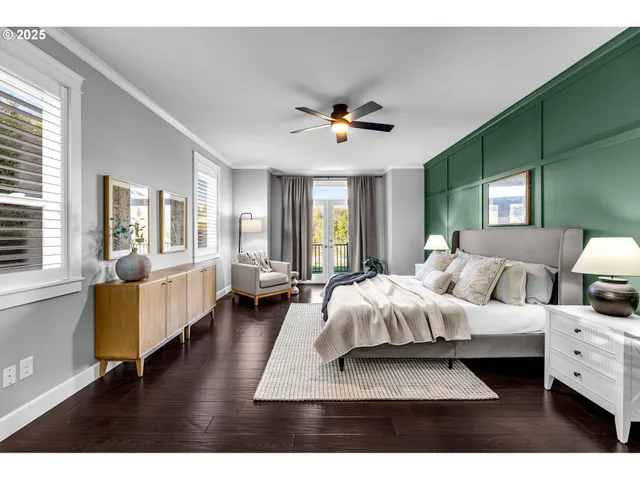 a bed room with bed and a large window