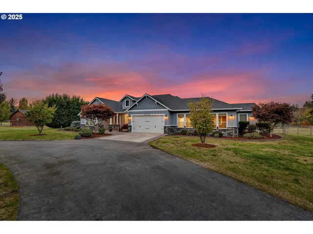 a view of a house with a big yard