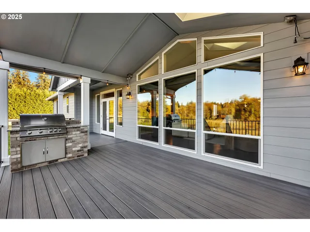 a open kitchen with wooden floor