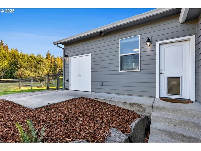 a view of a backyard of a house