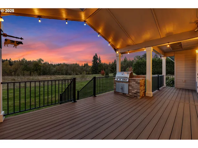 a view of a chairs on the roof deck