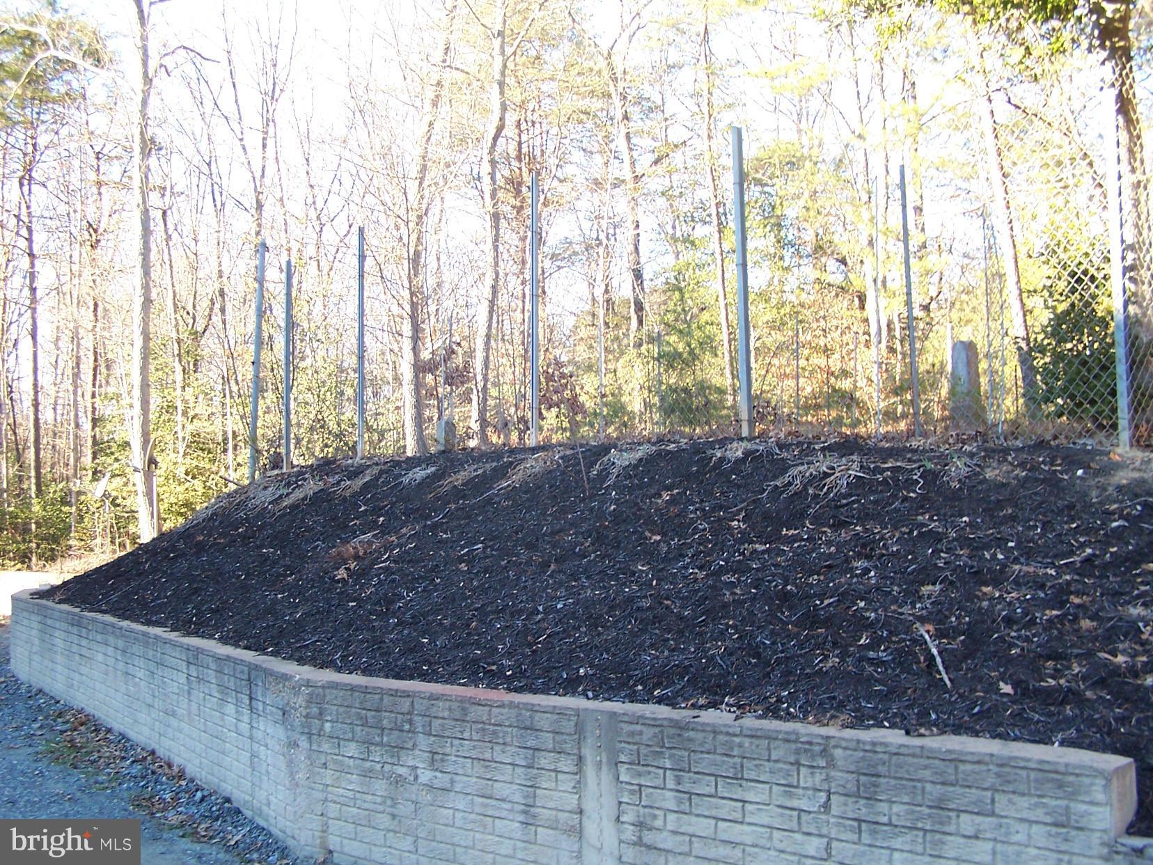 1079 Mountain View Road Fredericksburg, VA 22406 - Photo 29 of 30 retaining wall around cemetery