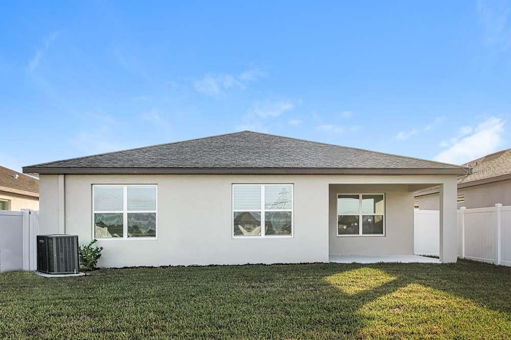 3645 Benham Rise Road Spring Hill, FL 34609 - Photo 7 of 7 a front view of house with yard