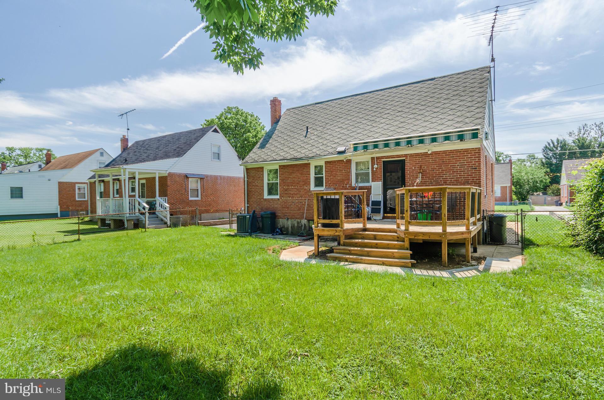 3522 Wild Cherry Road Baltimore, MD 21244 - Photo 28 of 30 a view of a house with a yard porch and sitting area