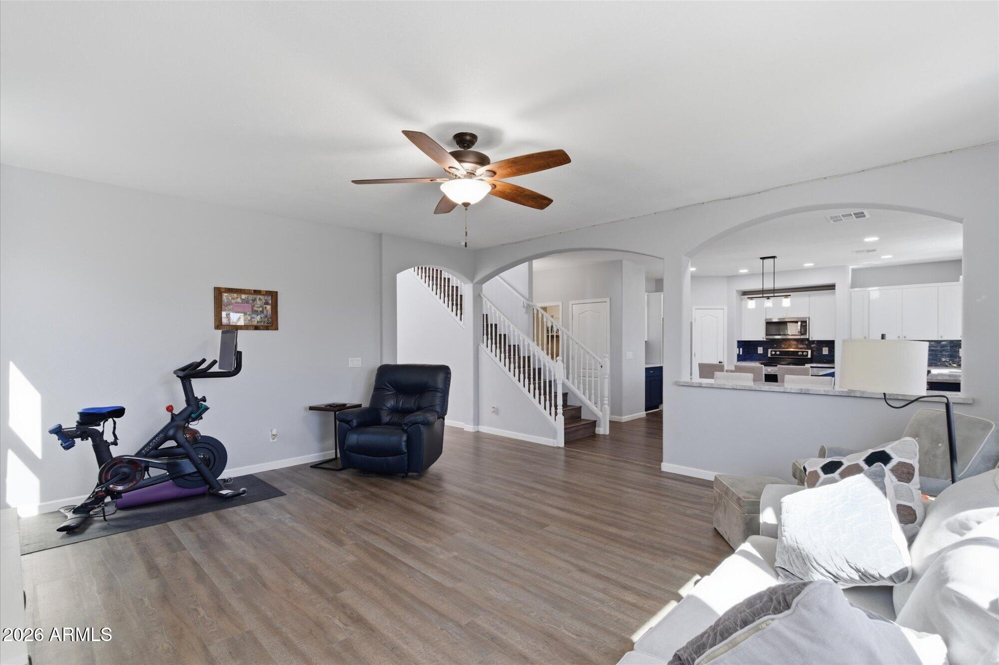 21915 Dietz Drive Maricopa, AZ 85138 - Photo 8 of 31 a living room with furniture and wooden floor