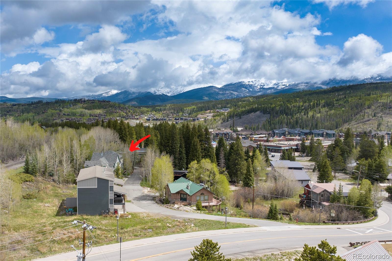 327 Vasquez Road, Unit E1 Winter Park, CO 80482 - Photo 5 of 43 a view of a lake with a houses