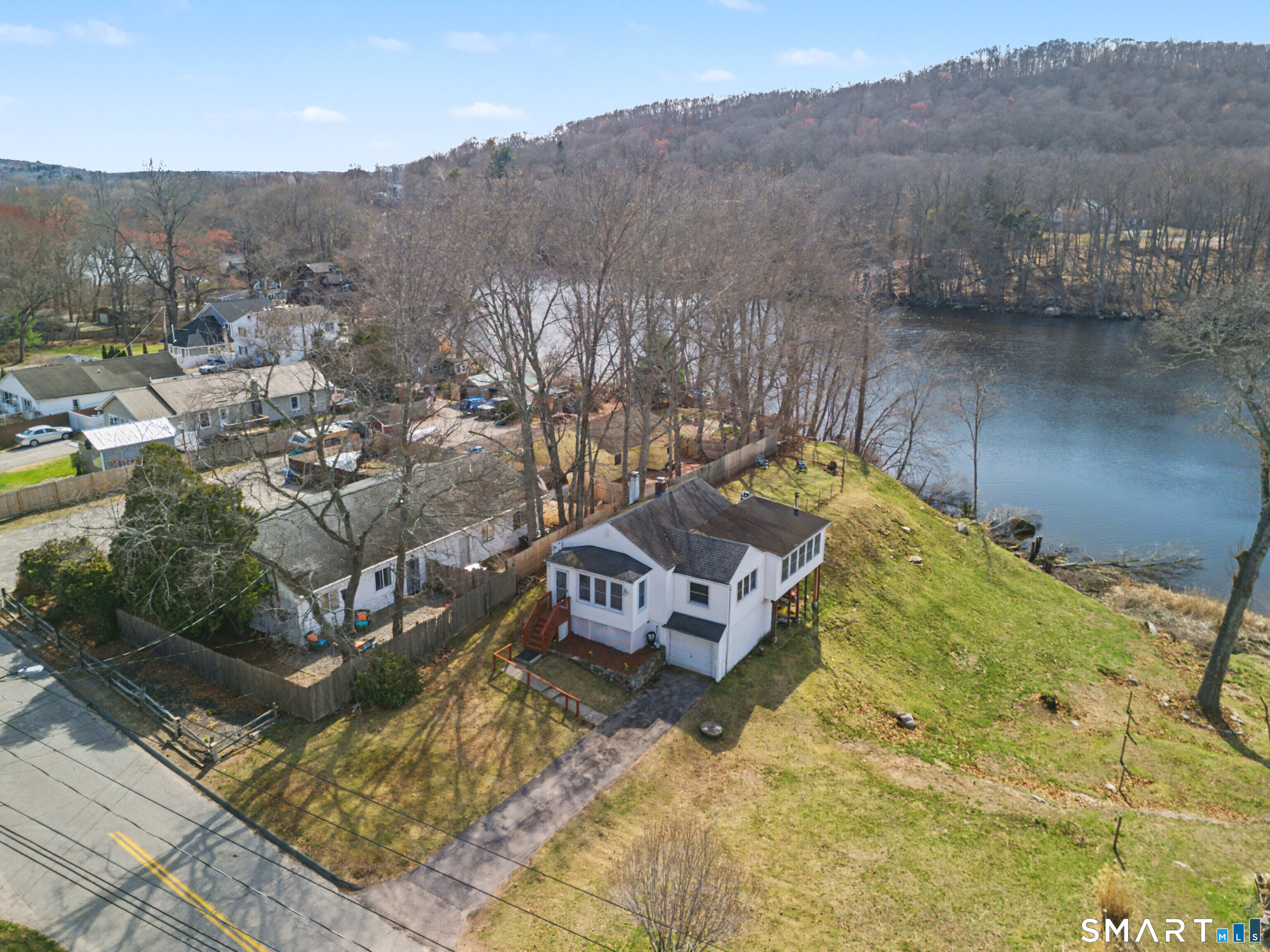 95 Kitemaug Road Montville, CT 06382 - Photo 3 of 24 a view of a houses with a yard