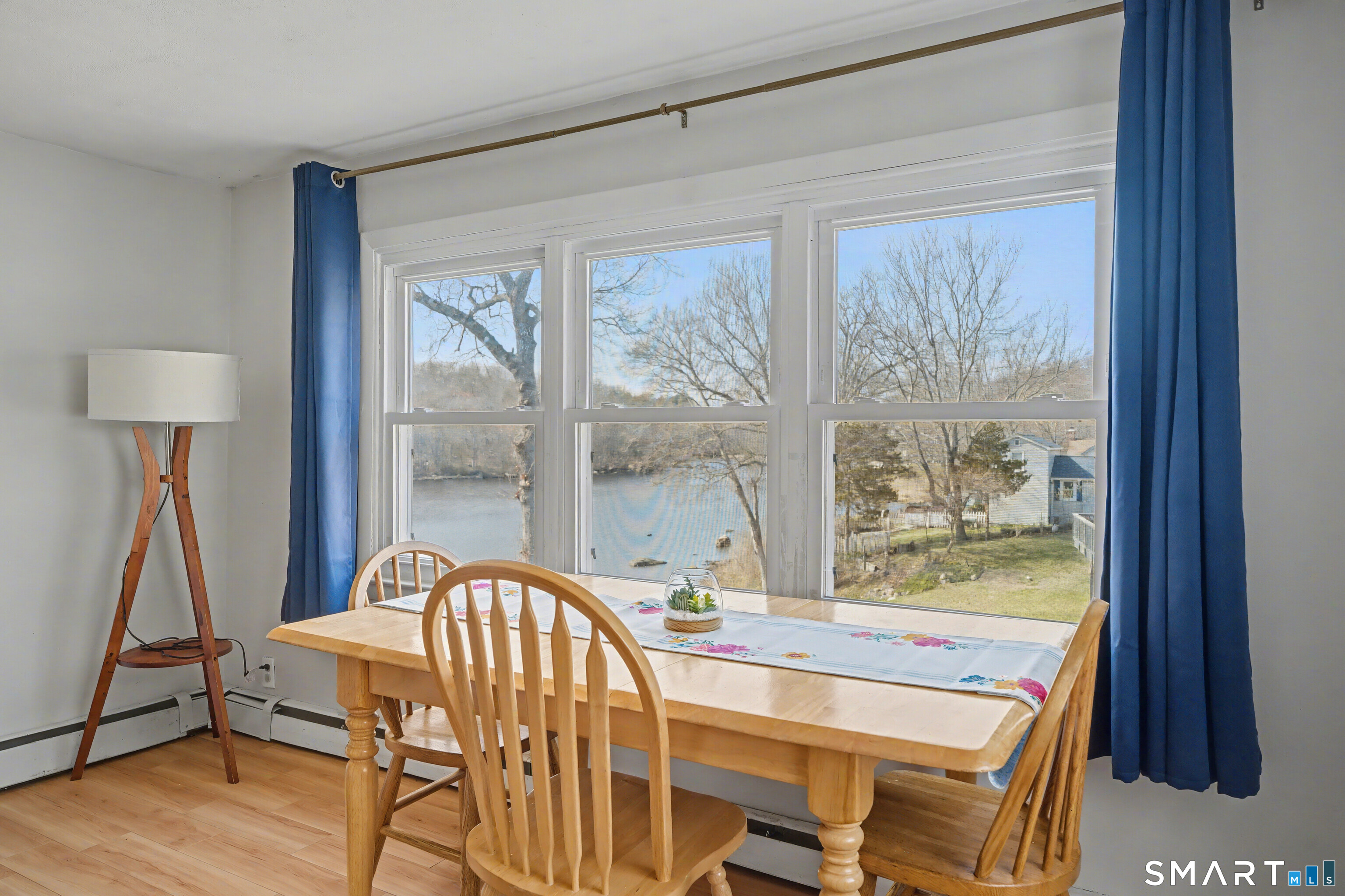 95 Kitemaug Road Montville, CT 06382 - Photo 8 of 24 a view of a dining room with furniture window and wooden floor