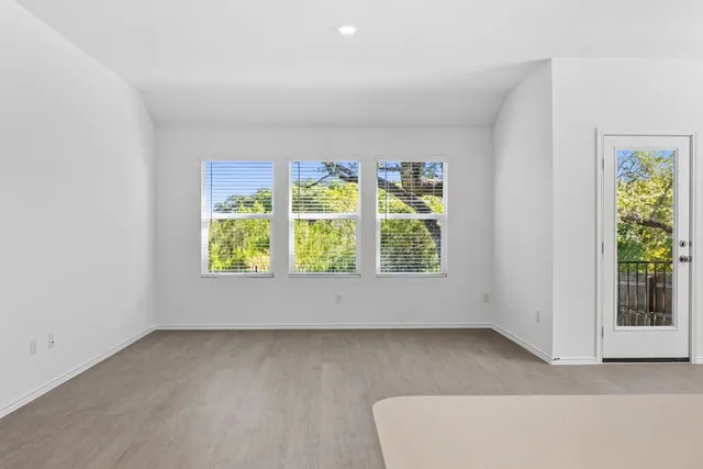 a kitchen with a sink and a window