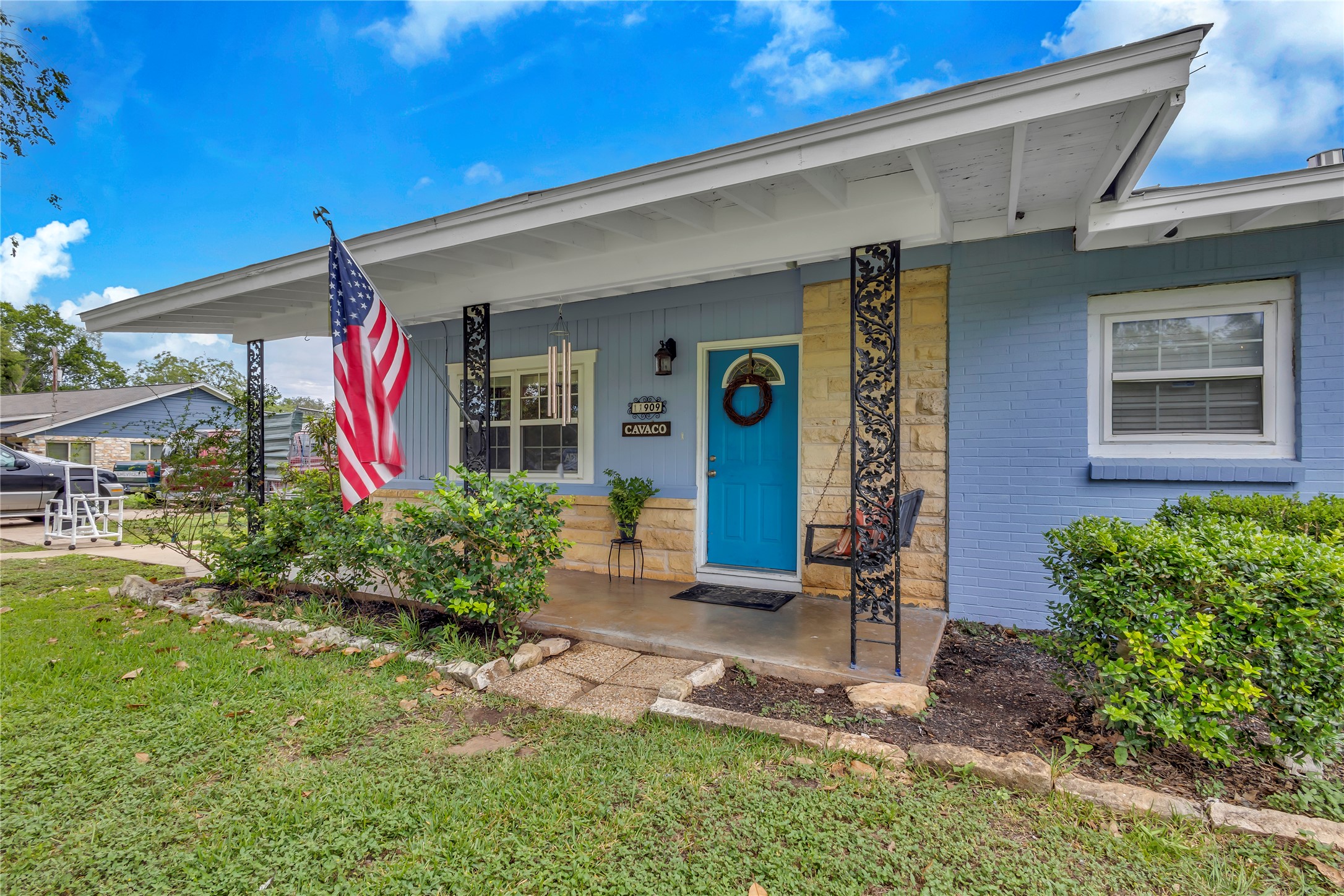 11909 Bluebonnet Lane Manchaca, TX 78652 - Photo 1 of 30 a front view of a house with a yard