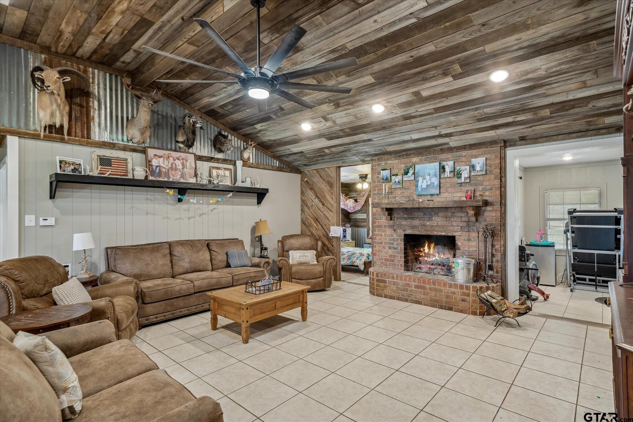350 Alaska Street Van, TX 75790 - Photo 14 of 37 a living room with furniture and a fireplace