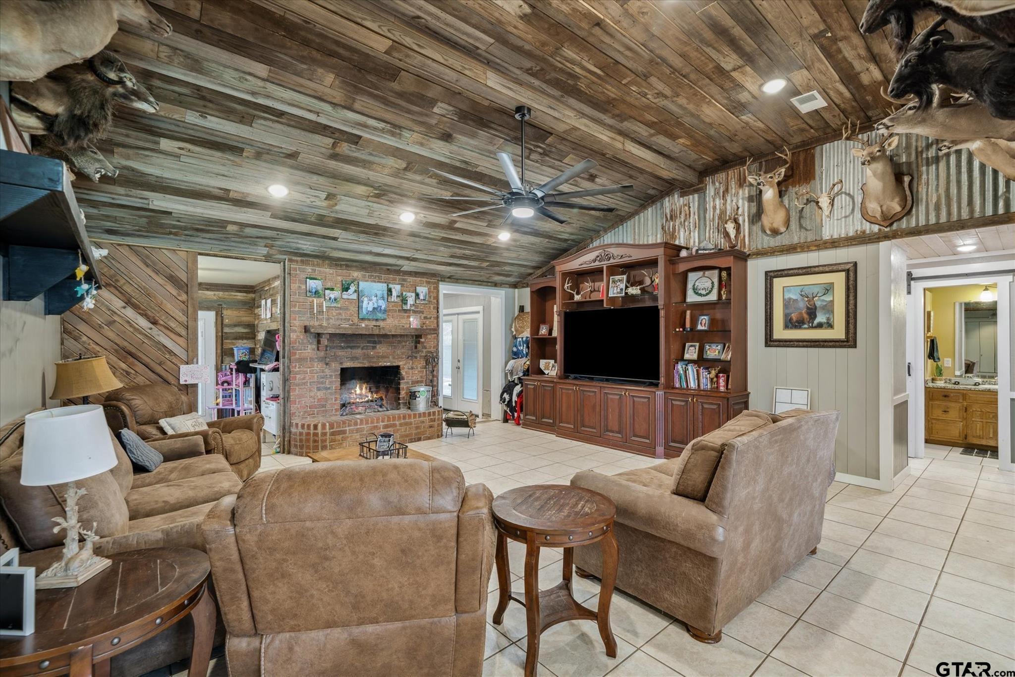 350 Alaska Street Van, TX 75790 - Photo 15 of 37 a living room with furniture and a flat screen tv