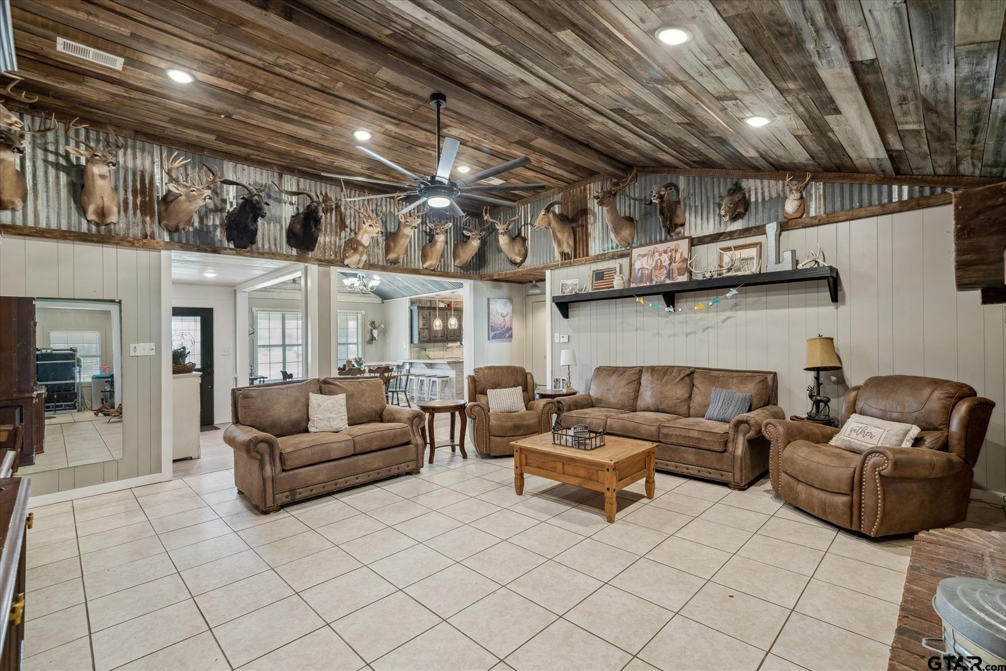 350 Alaska Street Van, TX 75790 - Photo 16 of 37 a living room with furniture and a chandelier