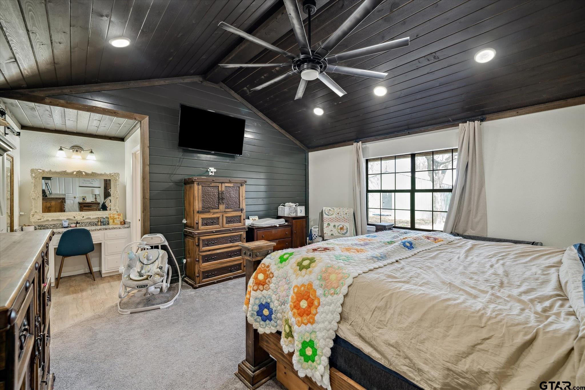 350 Alaska Street Van, TX 75790 - Photo 23 of 37 a bedroom with a bed window and a flat screen tv