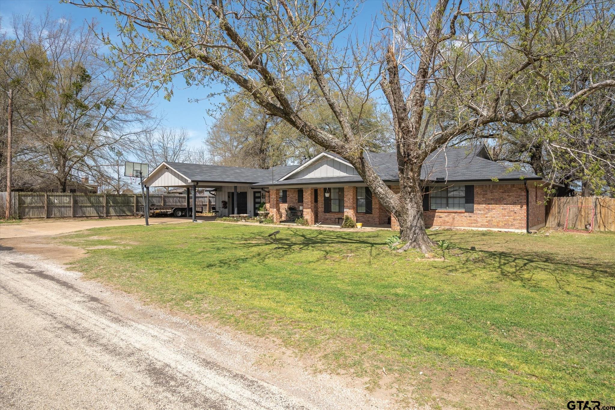 350 Alaska Street Van, TX 75790 - Photo 3 of 37 a house with swimming pool in front of it