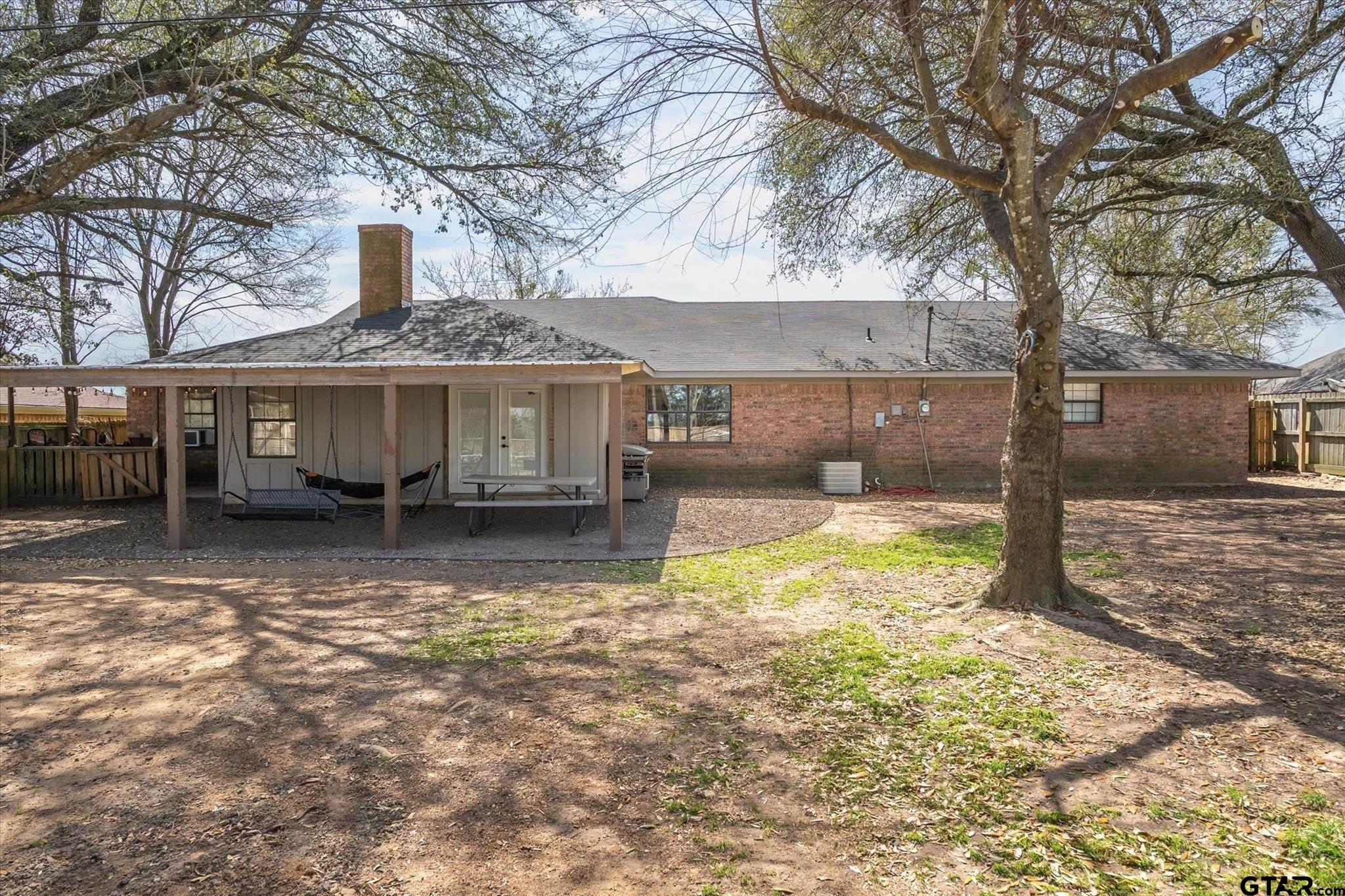350 Alaska Street Van, TX 75790 - Photo 33 of 37 a view of a house with a yard