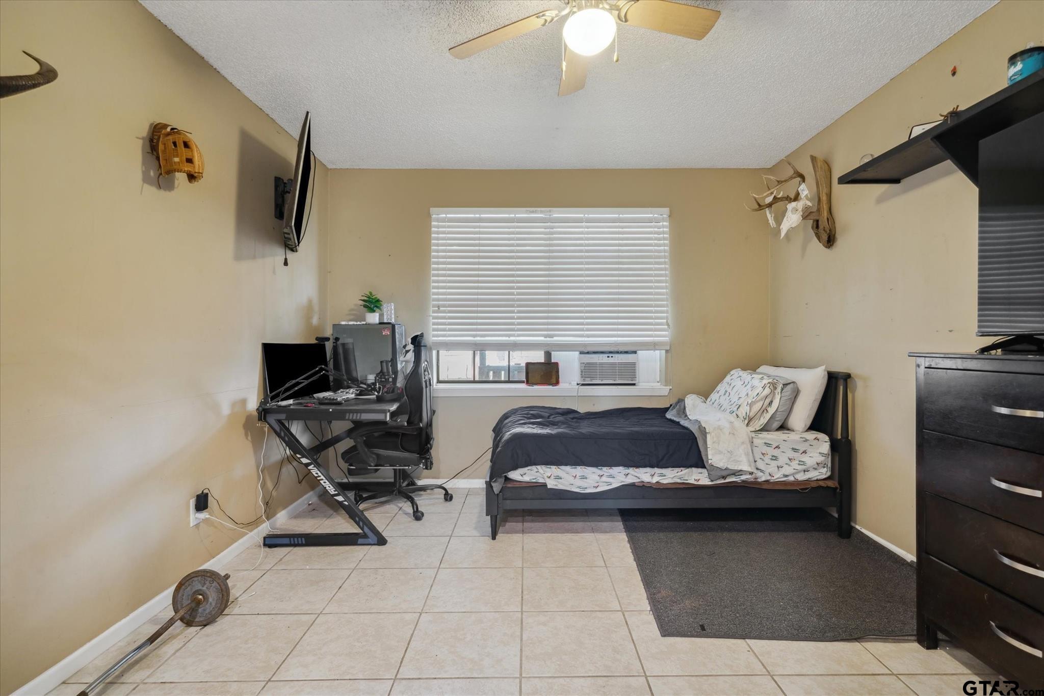 350 Alaska Street Van, TX 75790 - Photo 35 of 37 a bedroom with furniture and a window