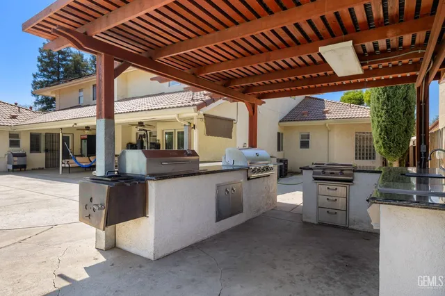 a bedroom with a bed and a television
