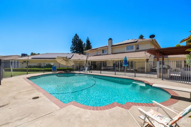 a large white tub sitting in a bathroom