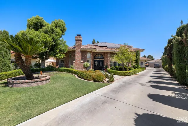 a view of a house with a garden