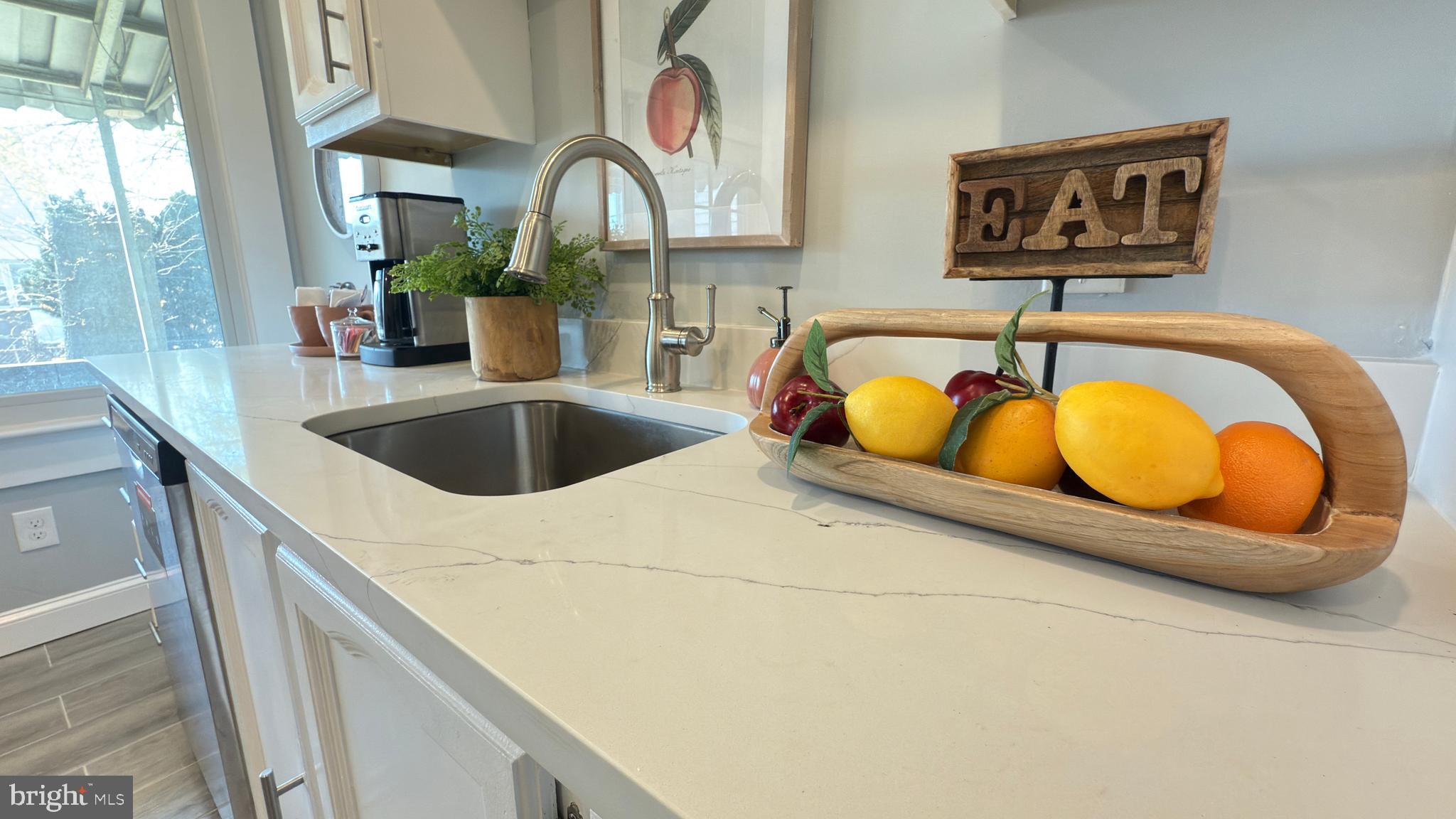 249 Hobart Avenue Hamilton, NJ 08629 - Photo 14 of 27 a bathroom with a granite countertop sink and a mirror