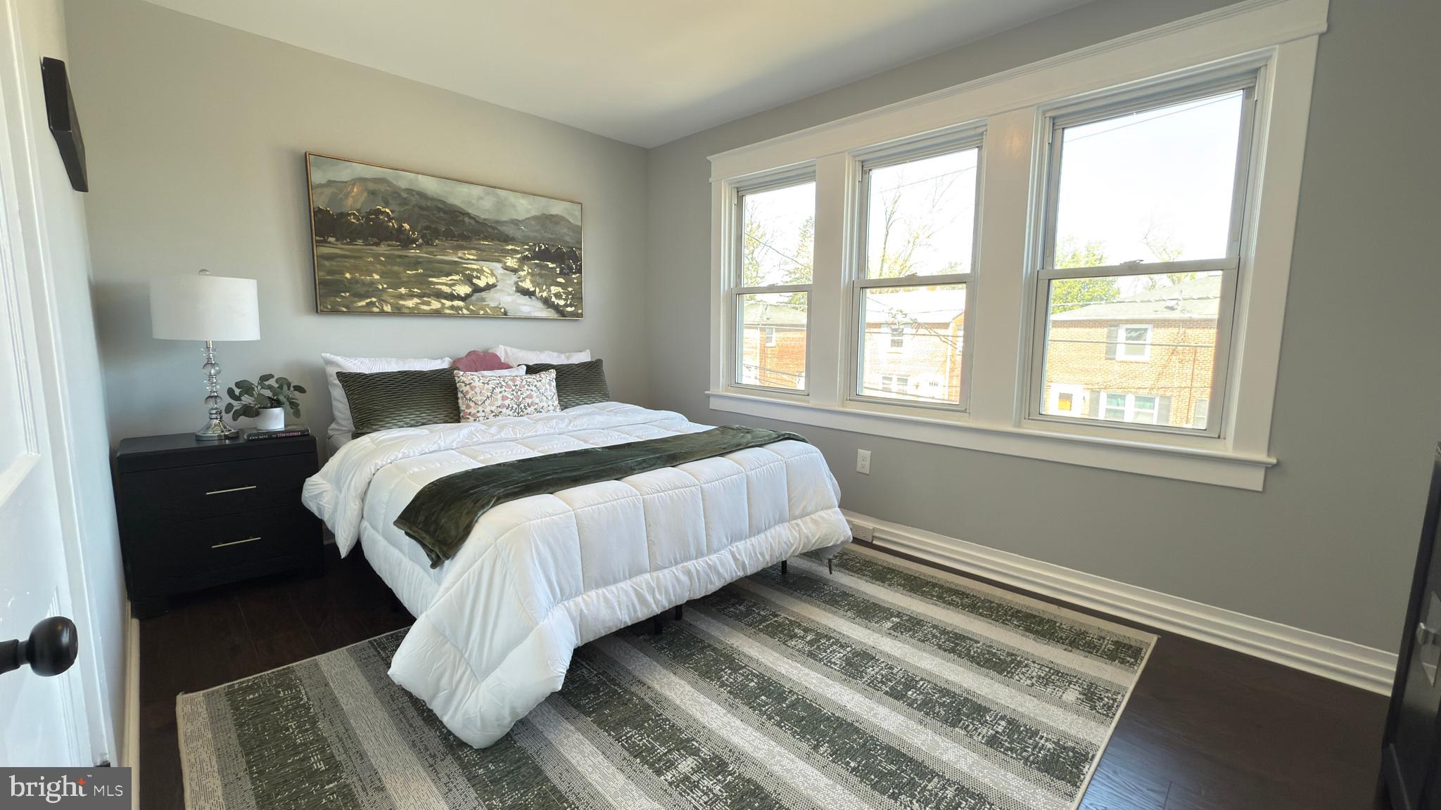 249 Hobart Avenue Hamilton, NJ 08629 - Photo 15 of 27 a bedroom with a bed and a window
