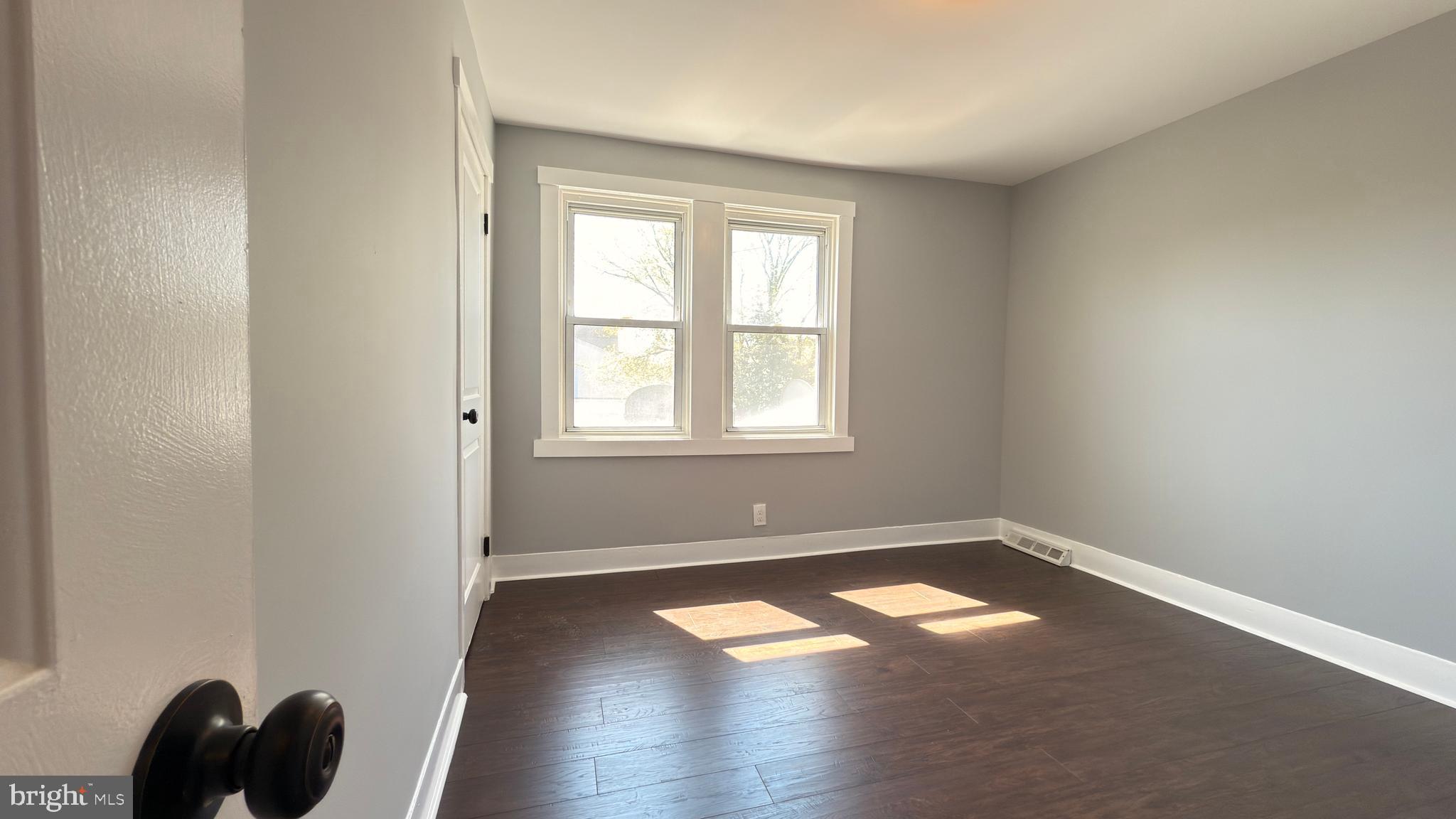 249 Hobart Avenue Hamilton, NJ 08629 - Photo 21 of 27 an empty room with a window