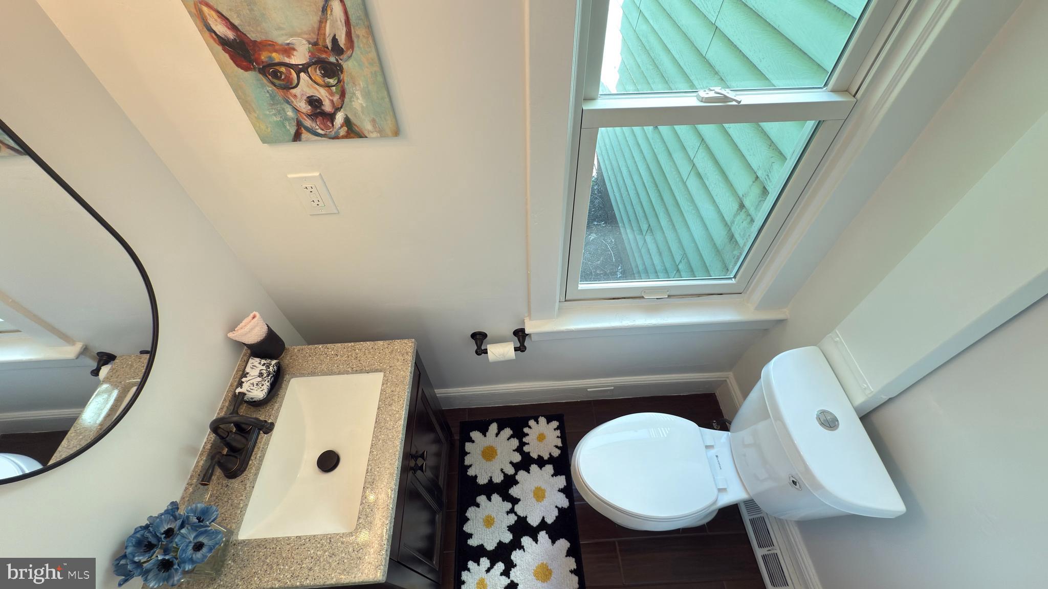 249 Hobart Avenue Hamilton, NJ 08629 - Photo 7 of 27 a bathroom with a toilet sink vanity mirror and tub