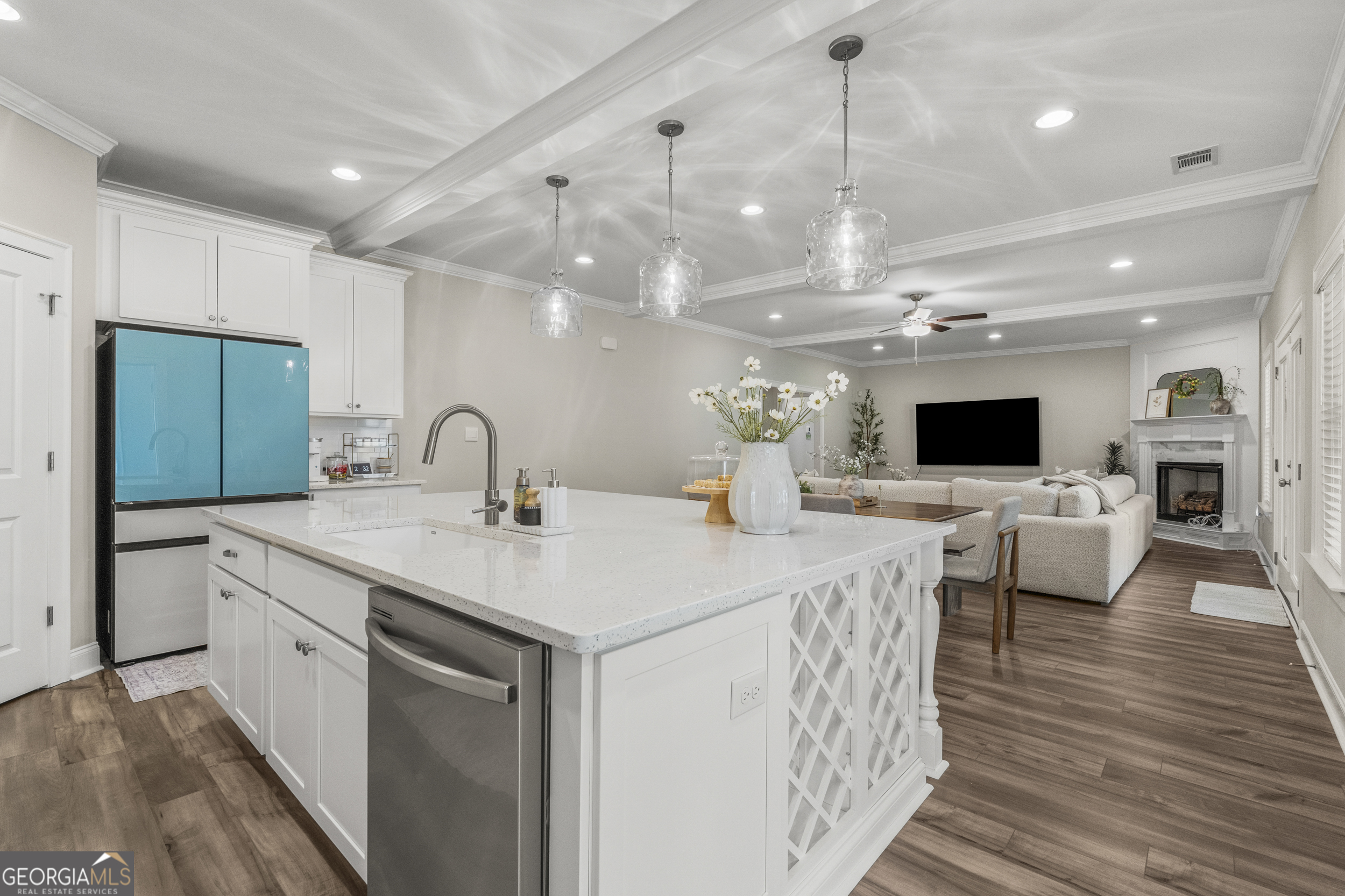 334 Orchard Drive Fortson, GA 31808 - Photo 11 of 48 a view of a kitchen counter space with furniture and a flat screen tv
