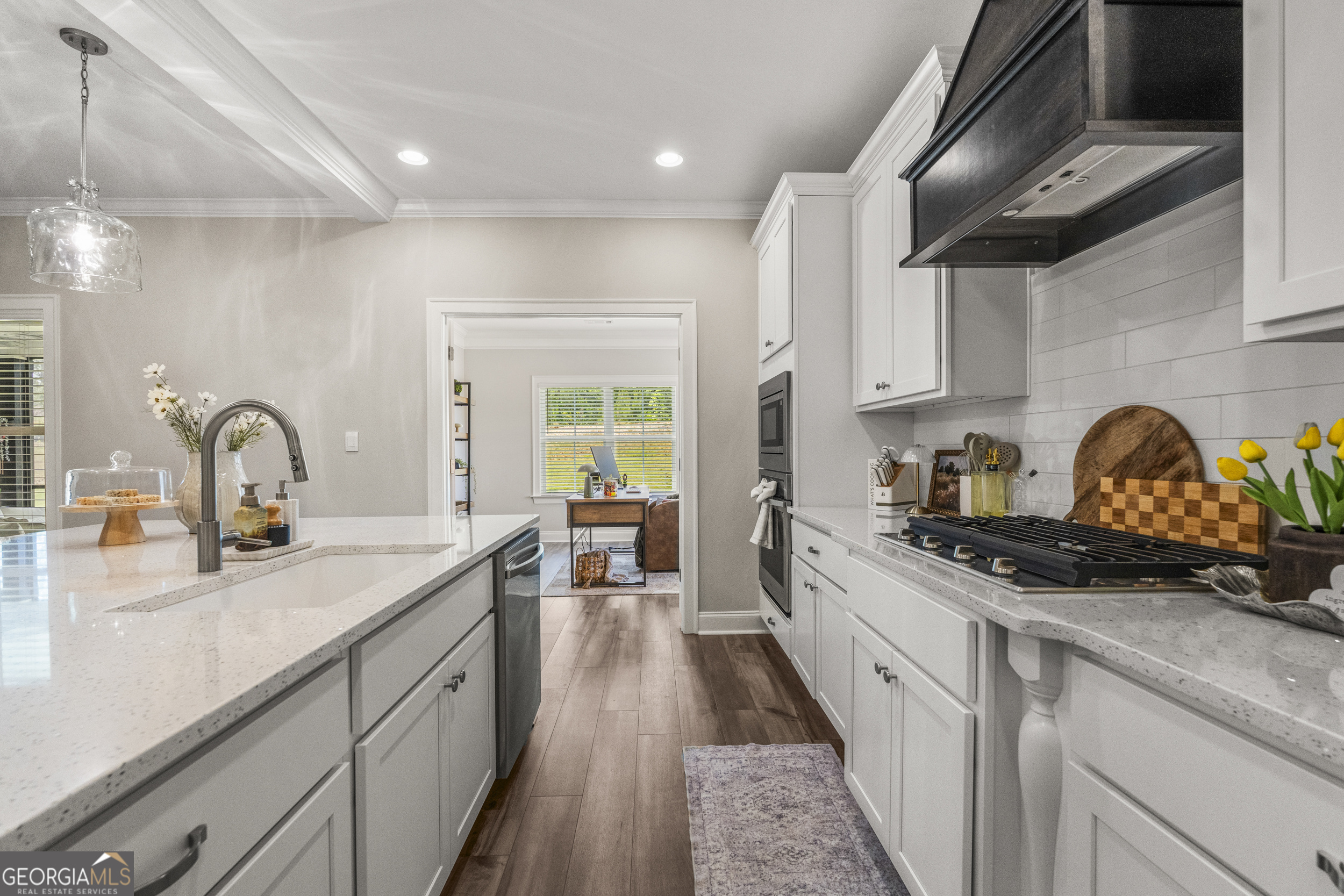 334 Orchard Drive Fortson, GA 31808 - Photo 14 of 48 a kitchen with sink a stove and cabinets