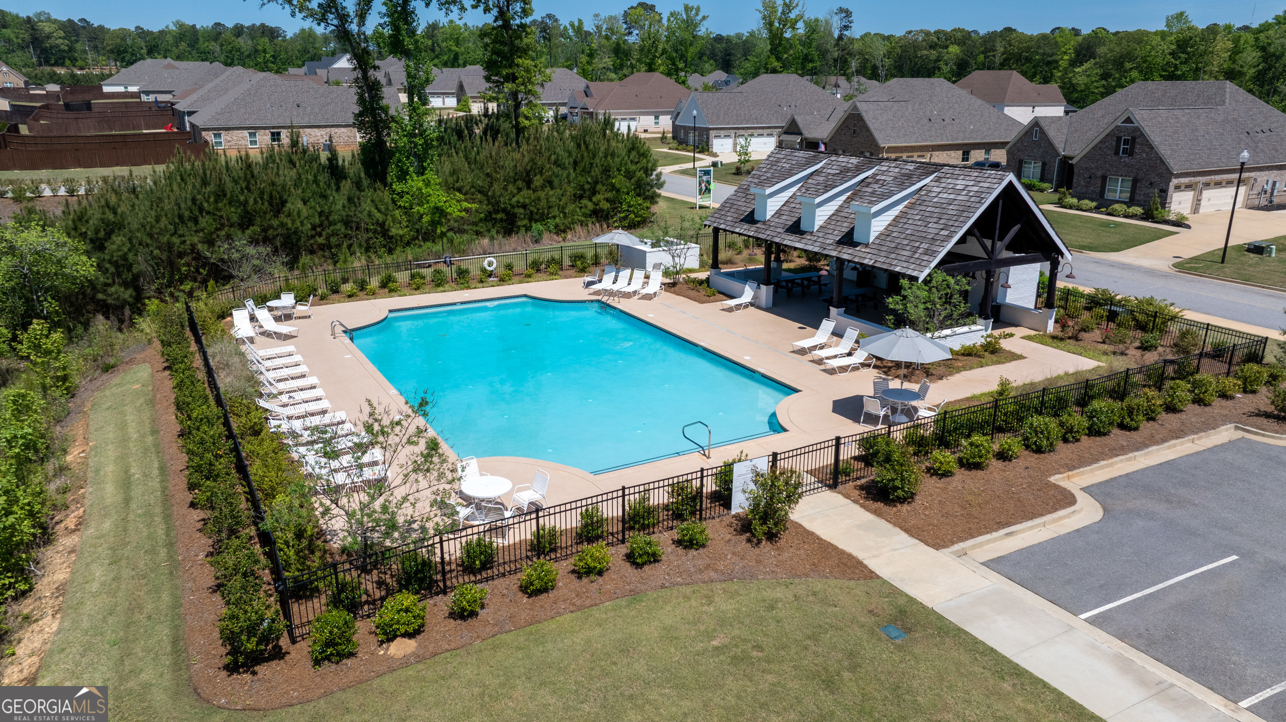 334 Orchard Drive Fortson, GA 31808 - Photo 2 of 48 an aerial view of a house with outdoor space pool seating area and yard