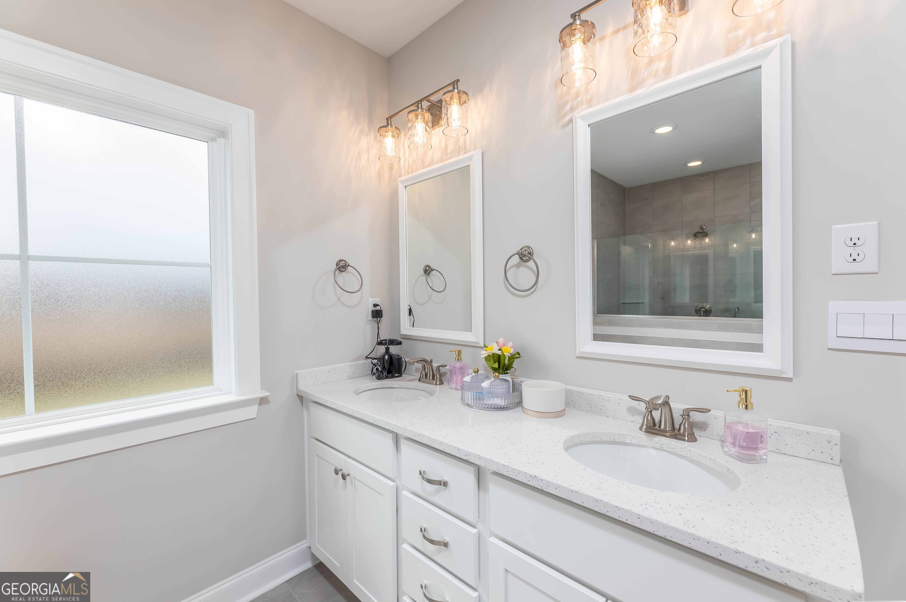 334 Orchard Drive Fortson, GA 31808 - Photo 28 of 48 a bathroom with a granite countertop sink mirror and
