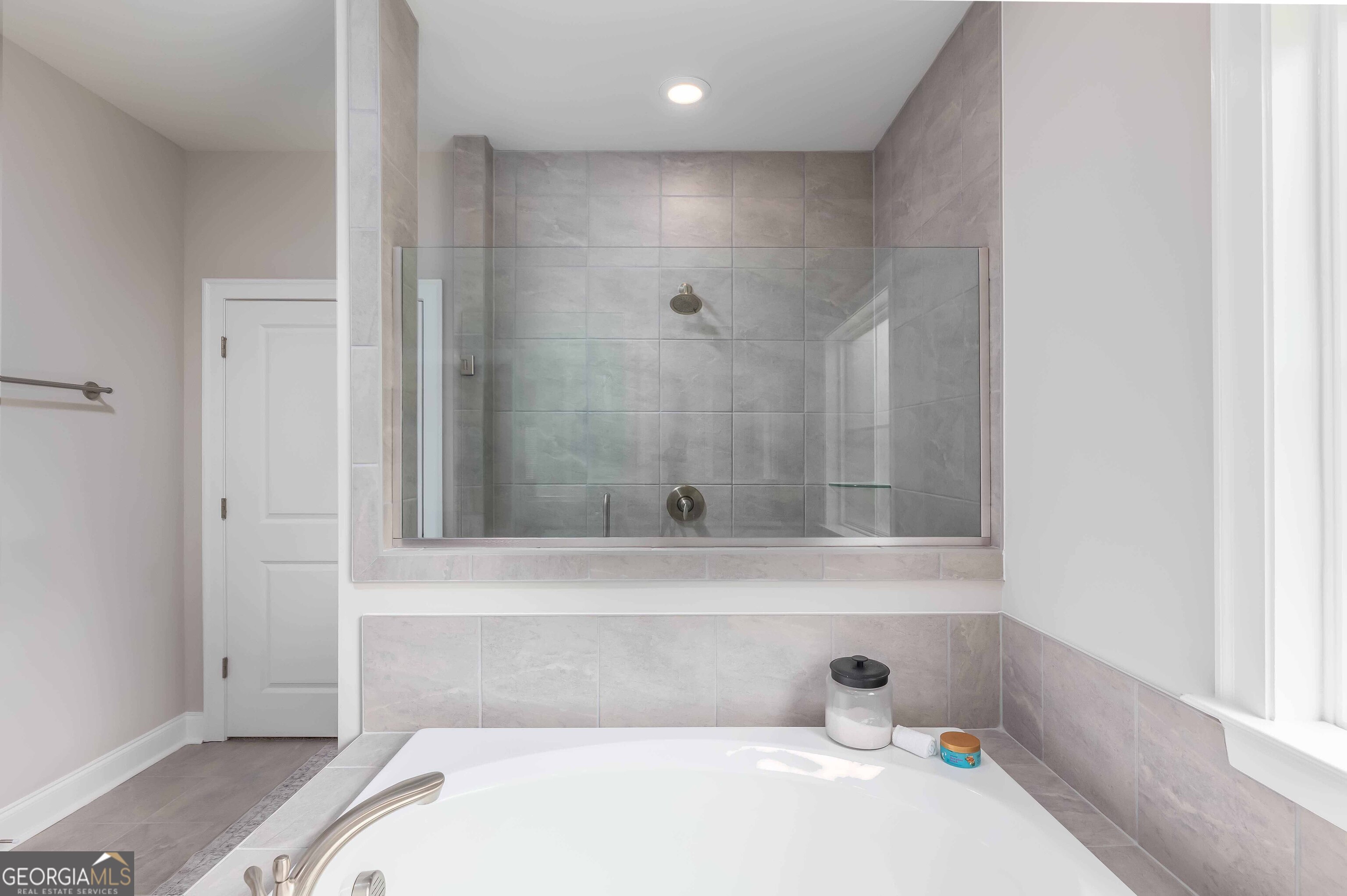 334 Orchard Drive Fortson, GA 31808 - Photo 29 of 48 a bathroom with a bathtub and shower