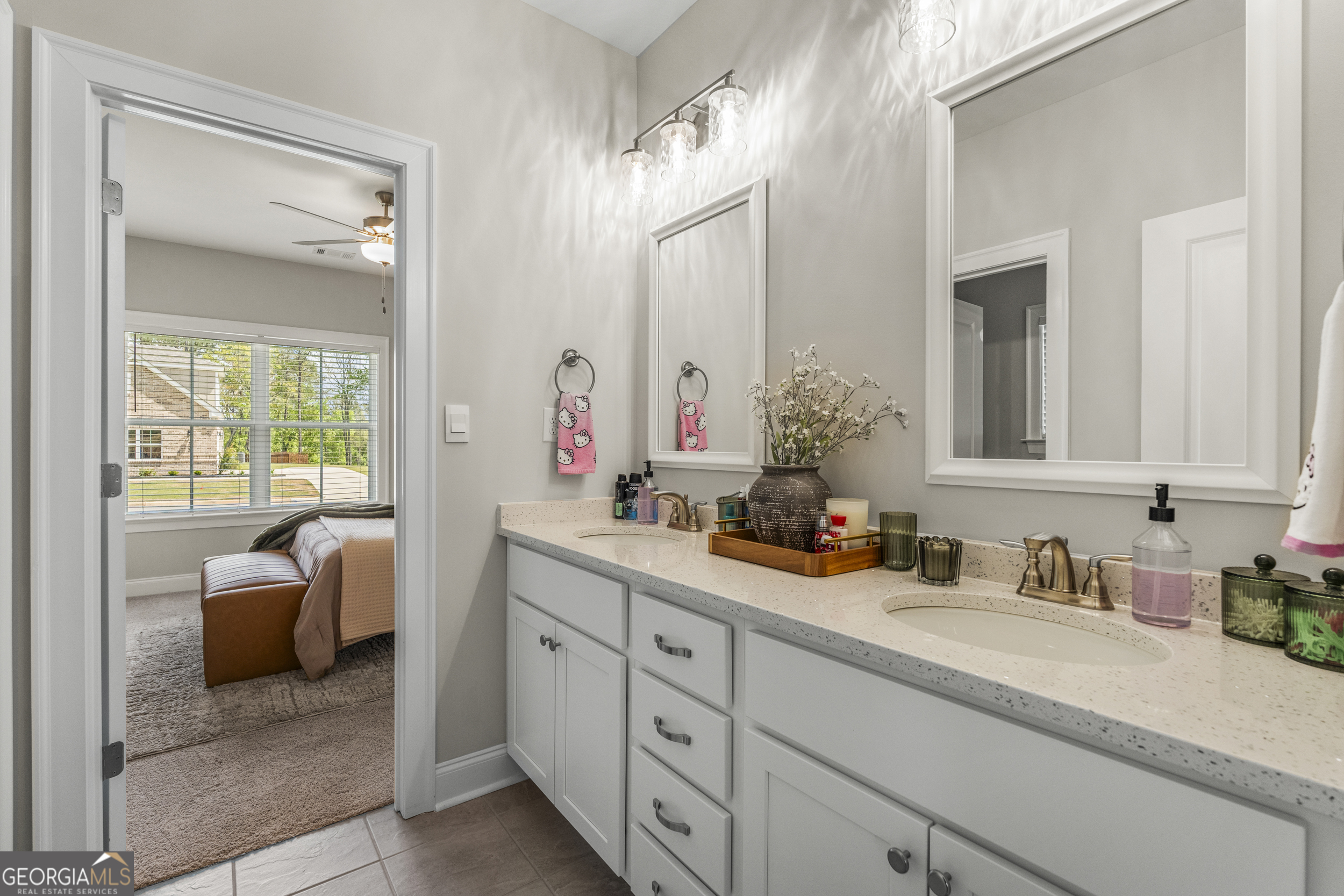 334 Orchard Drive Fortson, GA 31808 - Photo 34 of 48 a bathroom with a sink double vanity and mirror
