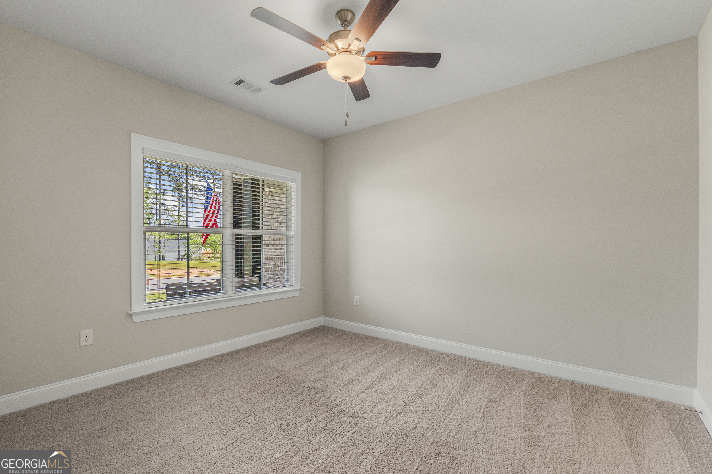334 Orchard Drive Fortson, GA 31808 - Photo 36 of 48 a view of an empty room with a window