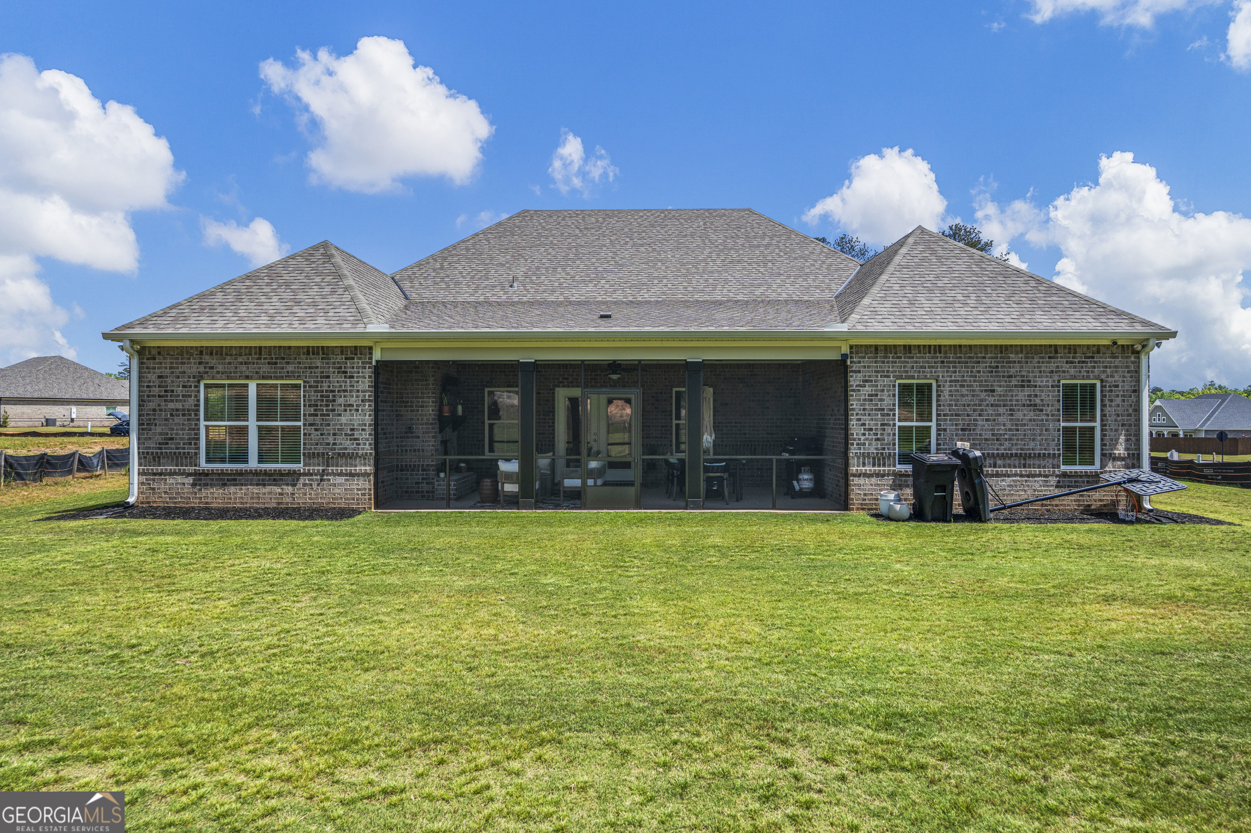 334 Orchard Drive Fortson, GA 31808 - Photo 41 of 48 a view of a house with a yard and sitting area
