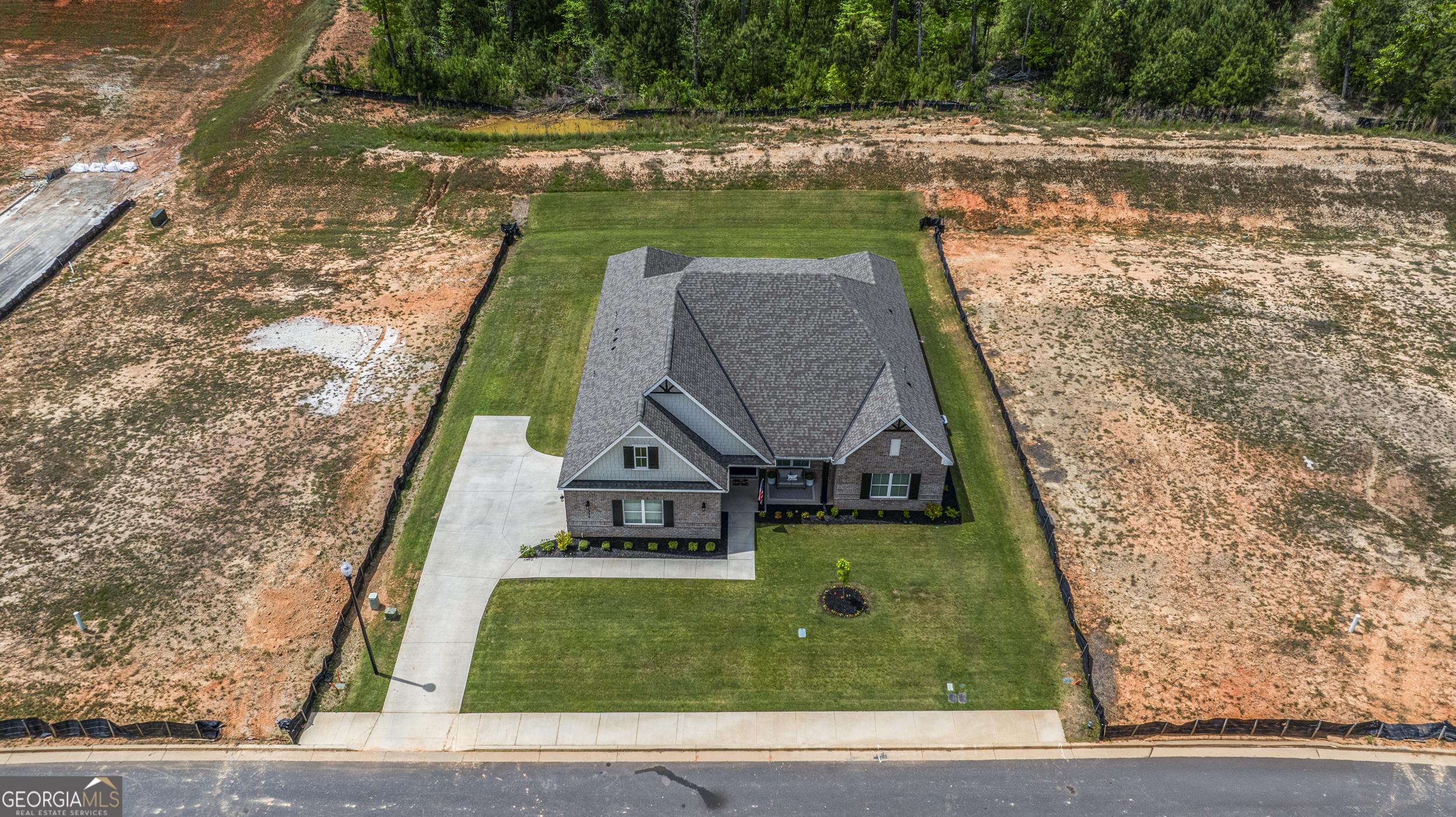 334 Orchard Drive Fortson, GA 31808 - Photo 43 of 48 a view of swimming pool with a garden and plants