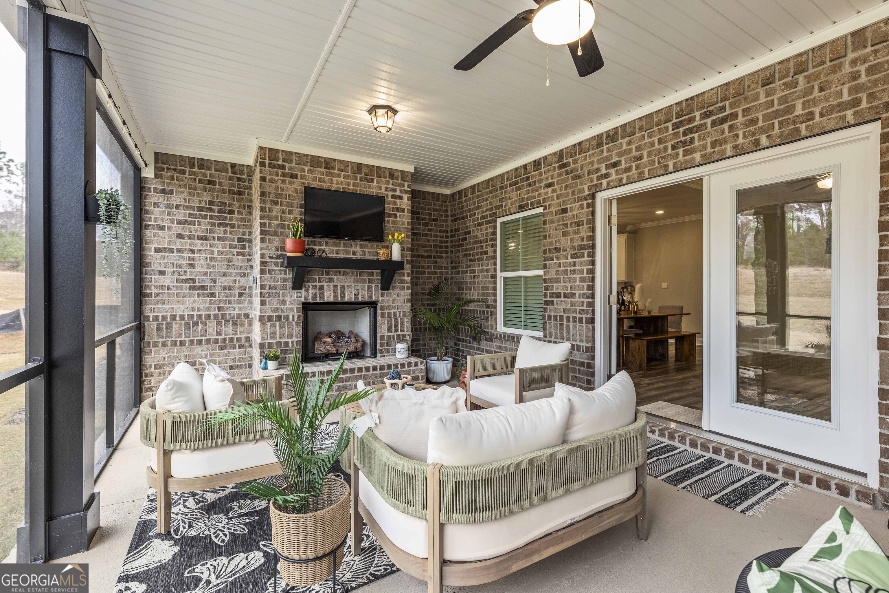 334 Orchard Drive Fortson, GA 31808 - Photo 5 of 48 a living room with fireplace furniture and a flat screen tv