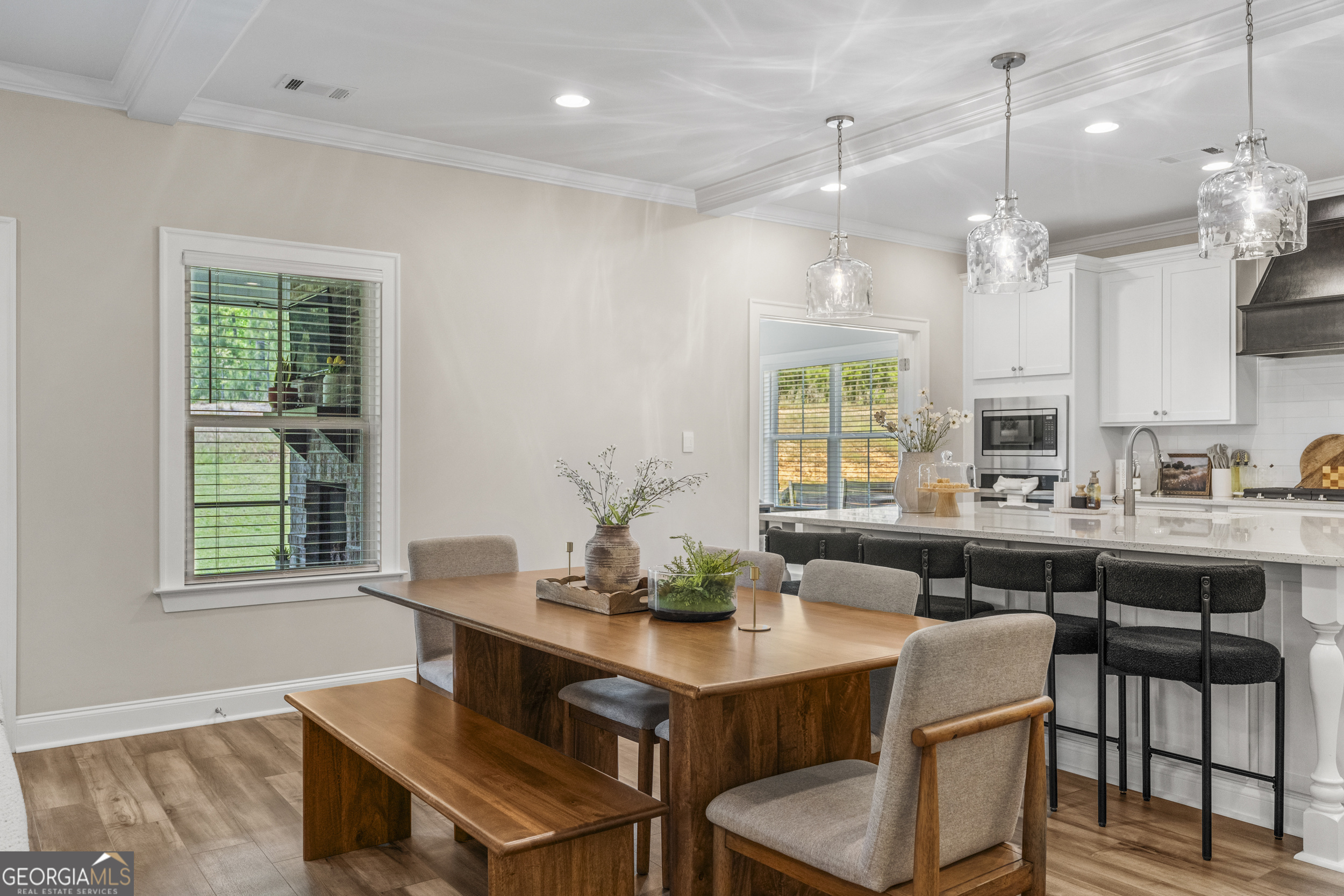 334 Orchard Drive Fortson, GA 31808 - Photo 10 of 48 a view of a a dining room with furniture window and wooden floor