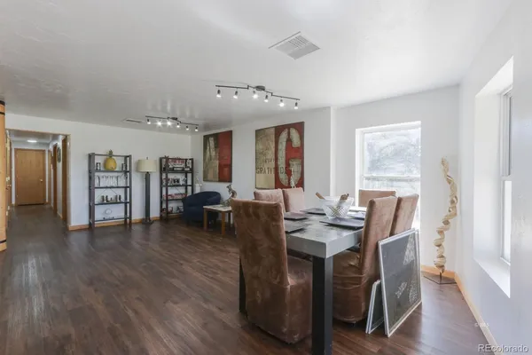a view of a livingroom with furniture and window