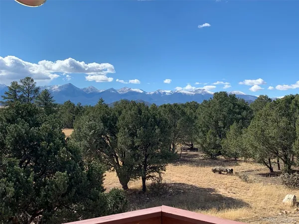 a view of a yard with mountain view