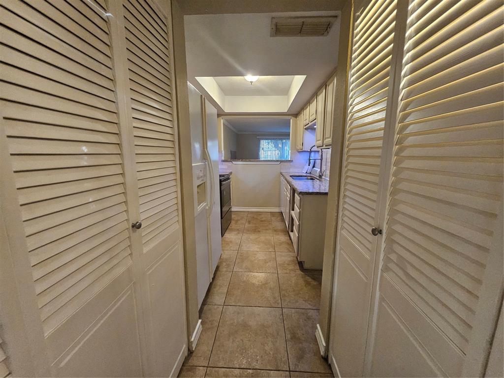 4535 North O'Connor Road, Unit 1214 Irving, TX 75062 - Photo 5 of 21 Pantry and laundry