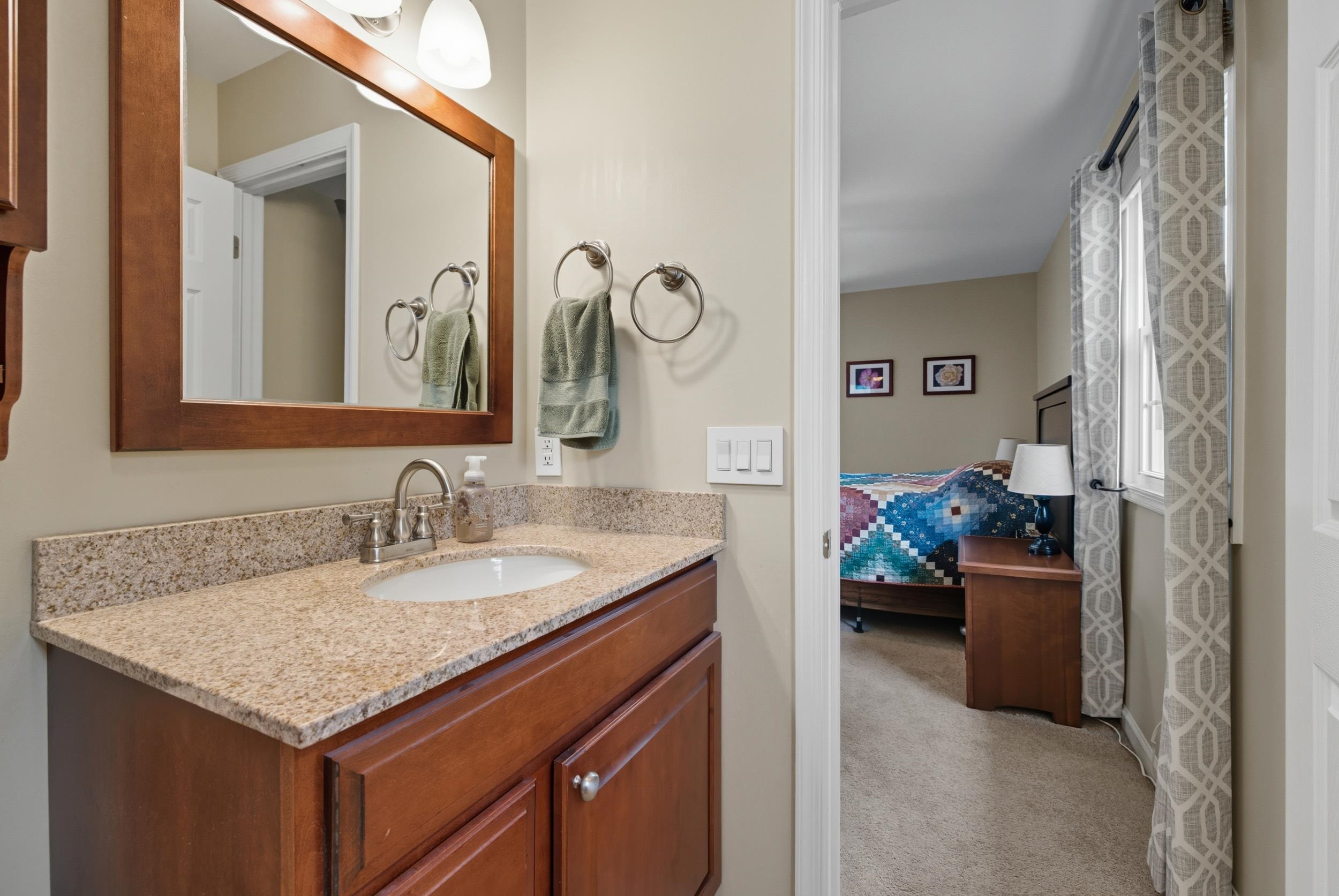 134 Rorrer Circle Harrisonburg, VA 22801 - Photo 18 of 74 a en suite bathroom with a granite countertop sink and a mirror