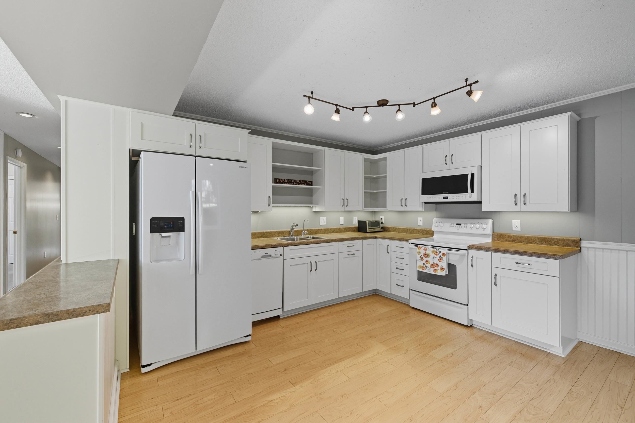 134 Rorrer Circle Harrisonburg, VA 22801 - Photo 30 of 74 a large kitchen with cabinets stainless steel appliances a sink and a center island