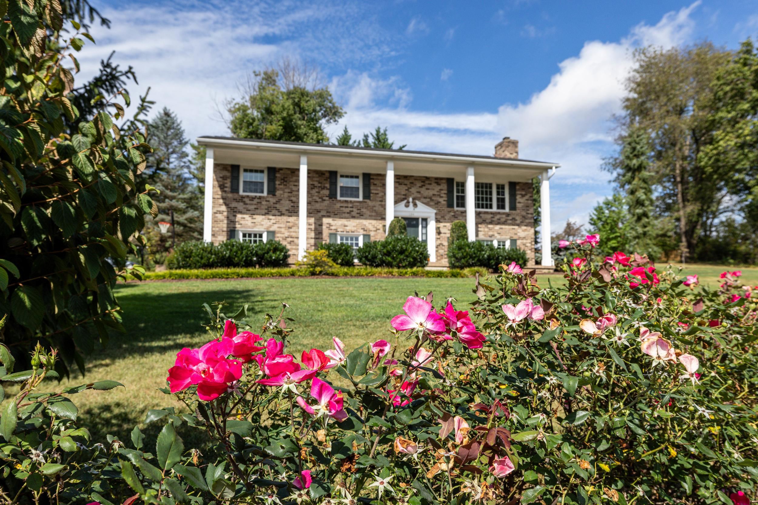 134 Rorrer Circle Harrisonburg, VA 22801 - Photo 46 of 74 a front view of a house with a big yard and potted plants