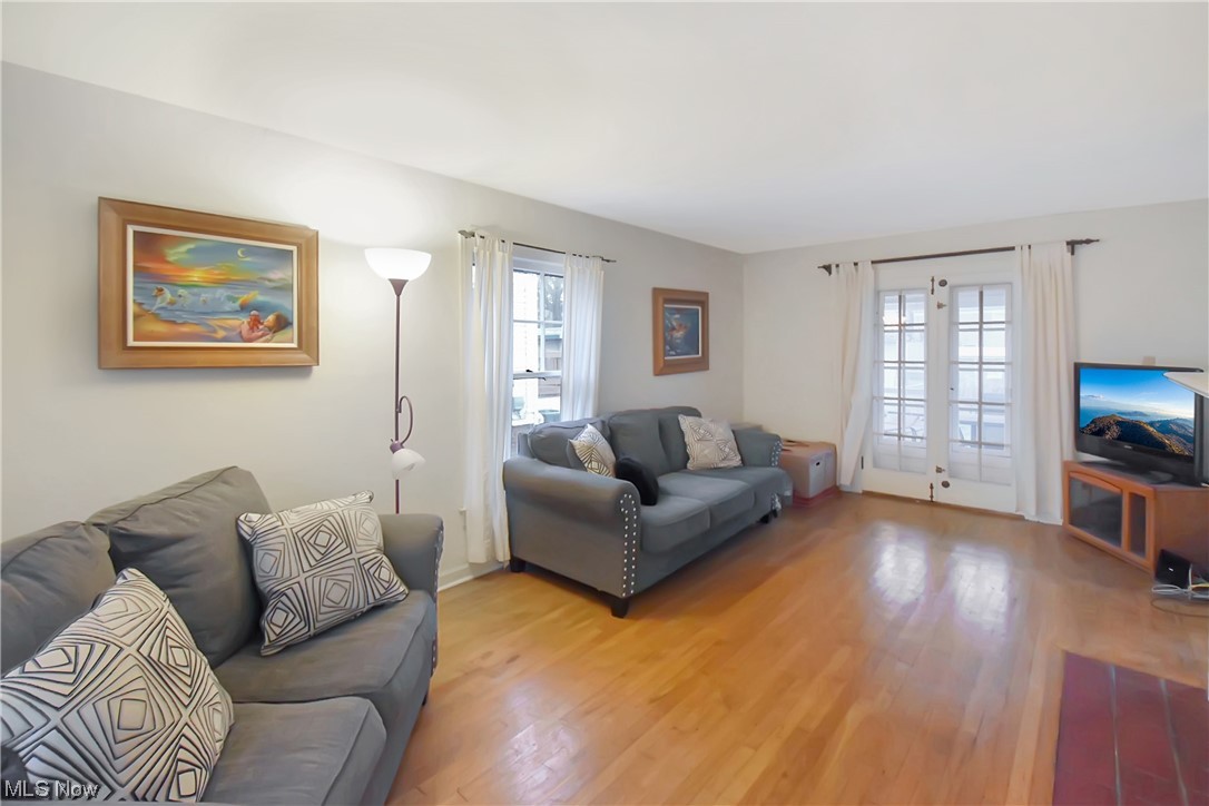 1068 Rushleigh Road Cleveland Heights, OH 44121 - Photo 2 of 22 Living room with light hardwood / wood-style floors and french doors